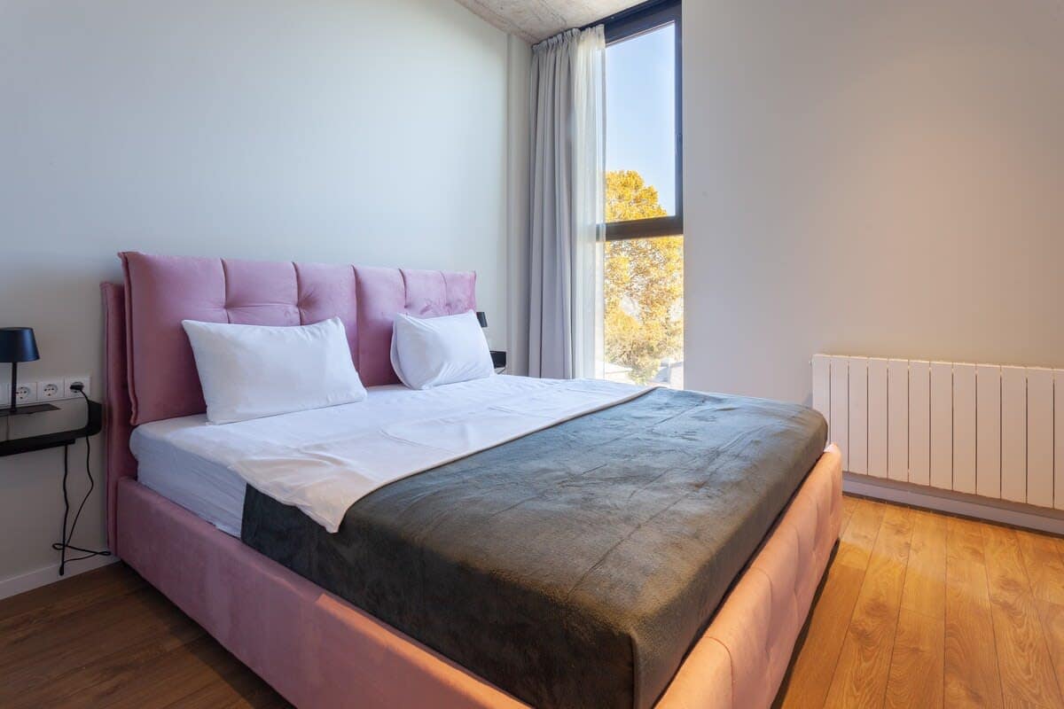 Large windows allow natural light to fill the room