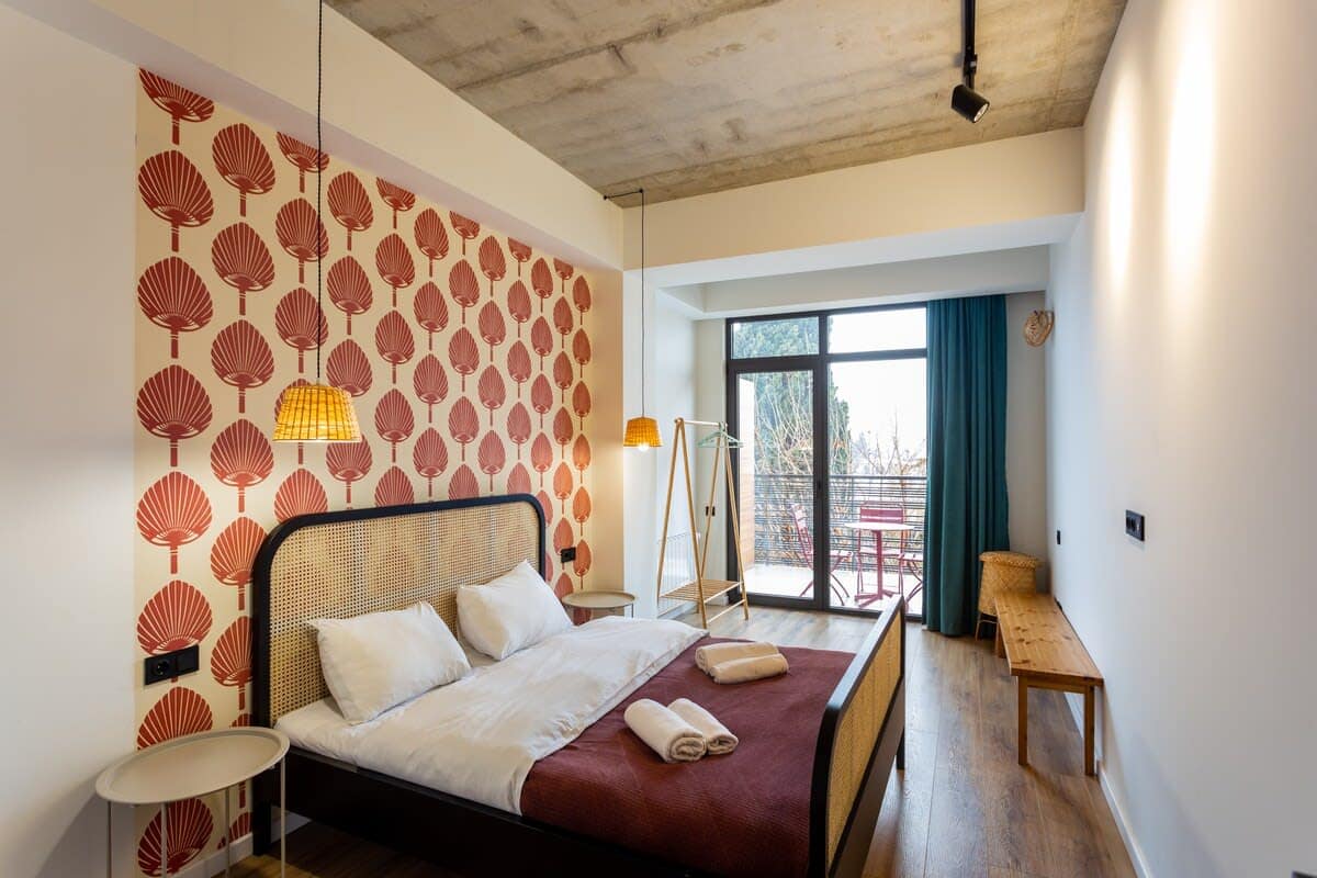 Inviting bedroom features a comfy double bed, designed for maximum comfort and a good night’s rest