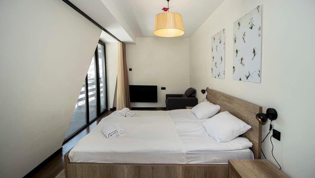 Comfy bedding ensures a restful sleep after a day of skiing.