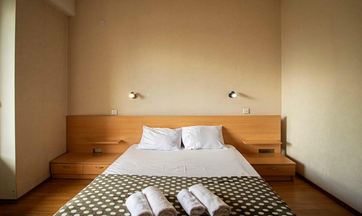 Bedside lamp provides soft illumination, perfect for winding down with a book or creating a relaxing atmosphere