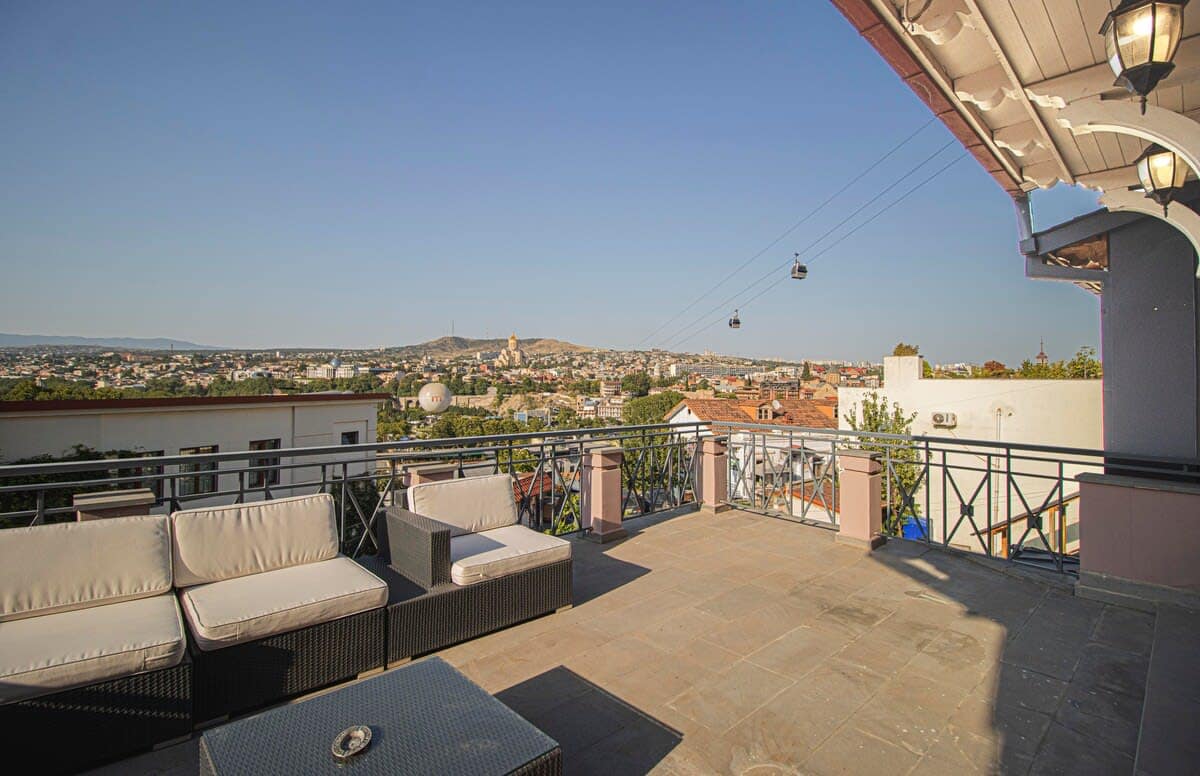 Enjoy iconic city views directly from the living area and balconies.
