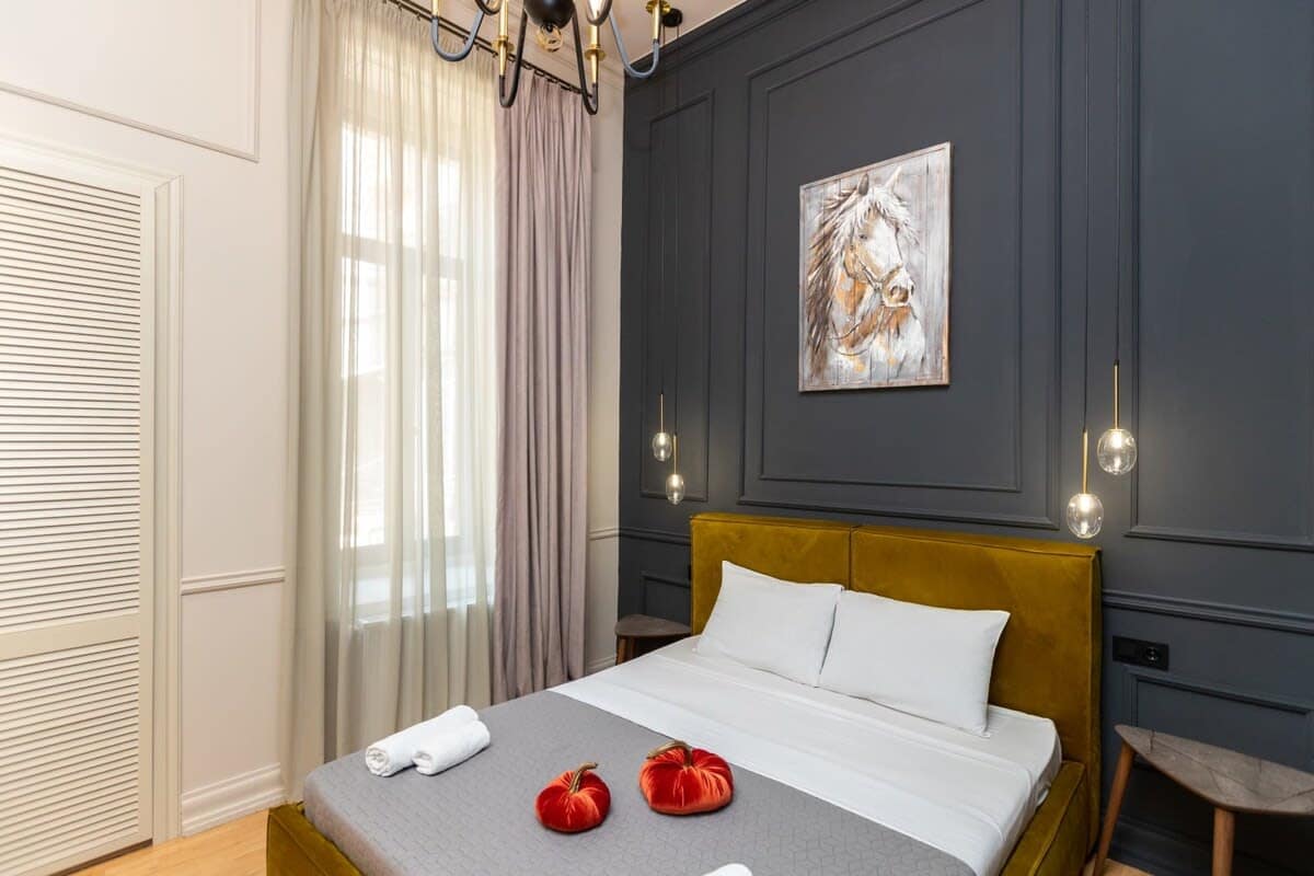 Accented with grey tones, and a window that enhances the calming ambiance.