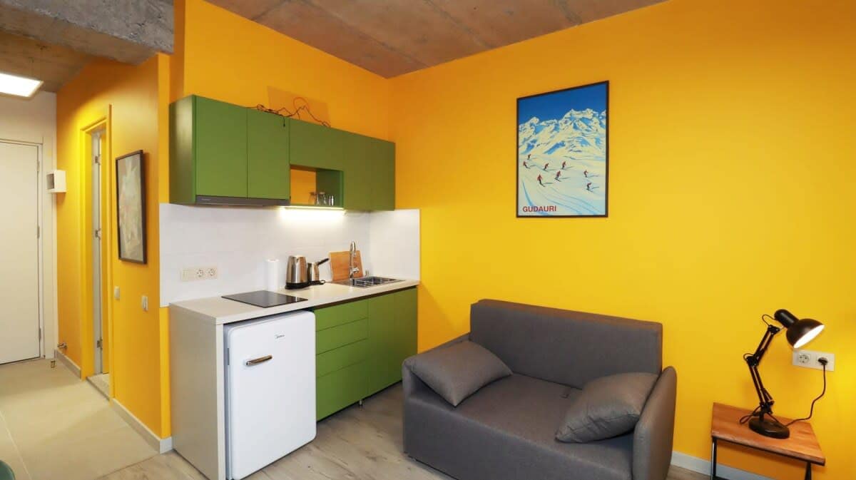The kitchen has all the bare essentials, including a mini fridge, kettle, coffee maker, and more.