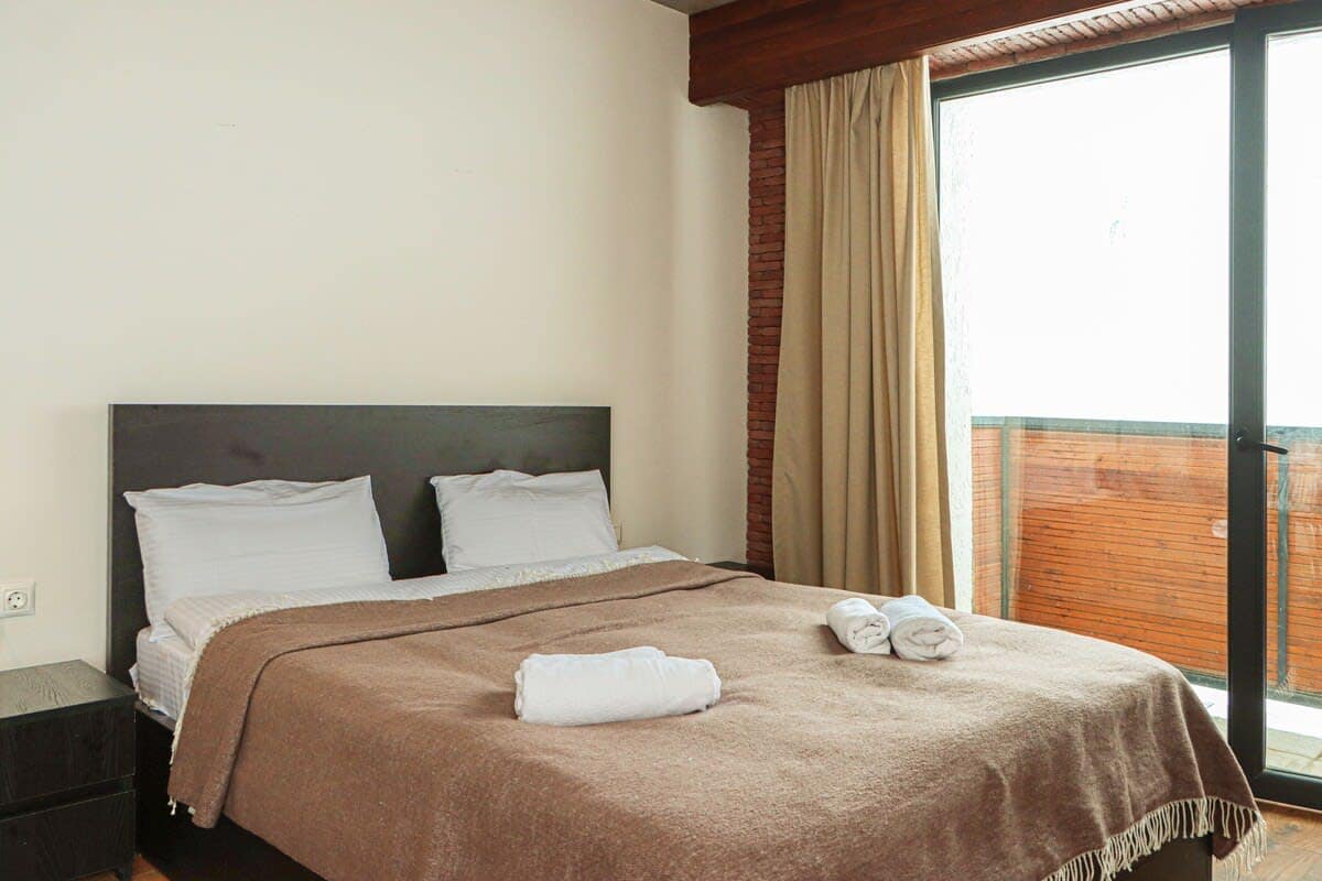 Enjoy a cozy king bed made up with top-quality hotel linens, ensuring your utmost comfort!