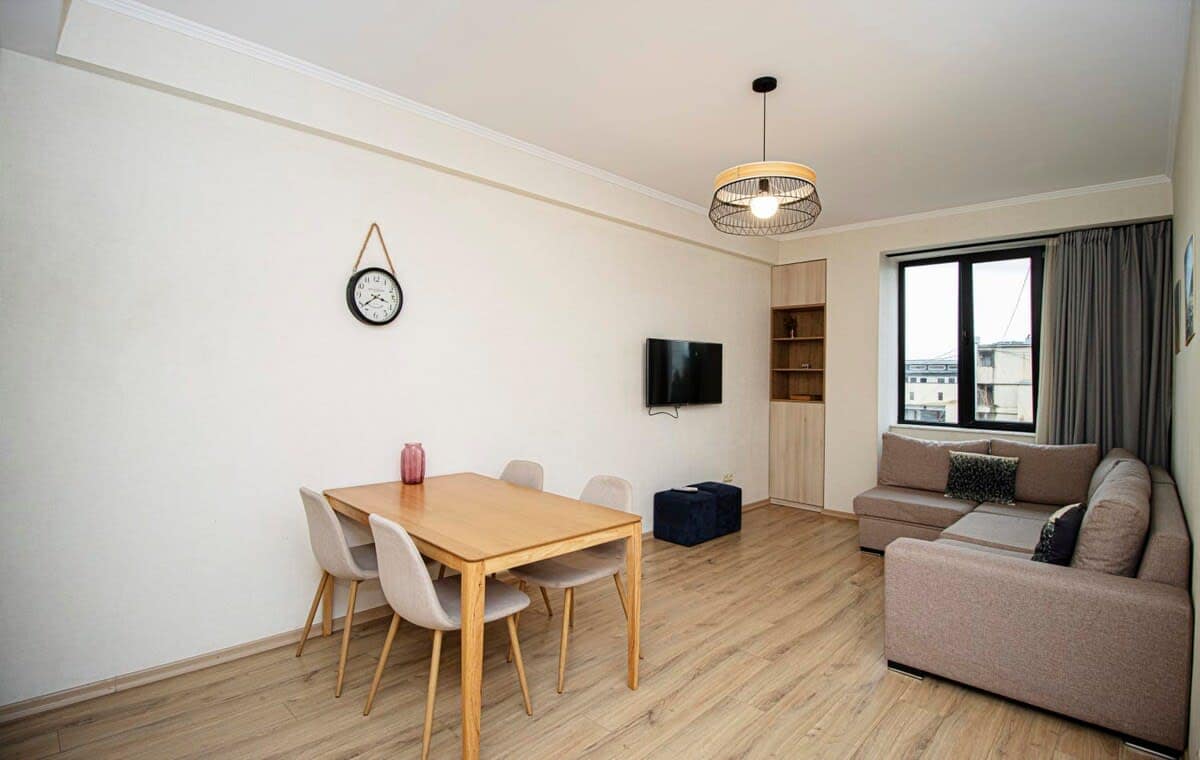 Cozy dining area complements the kitchen, offering a great space to enjoy meals.