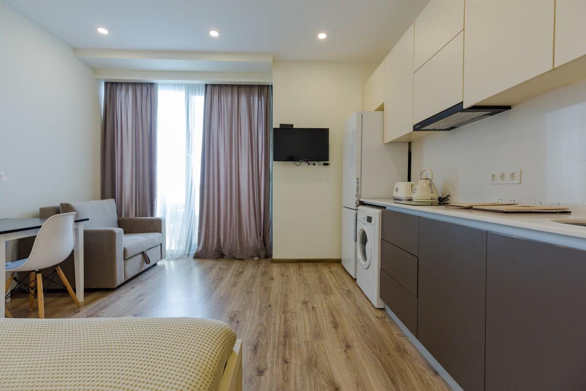 TV is positioned for optimal viewing, allowing you to unwind with your favorite shows or movies in a comfortable setting