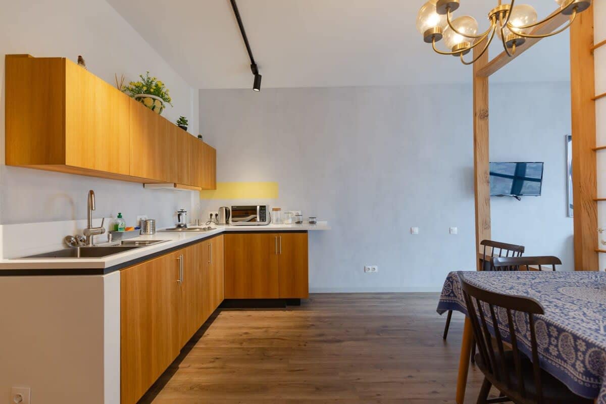 Kitchen seamless integration with the living space makes it a welcoming and practical addition