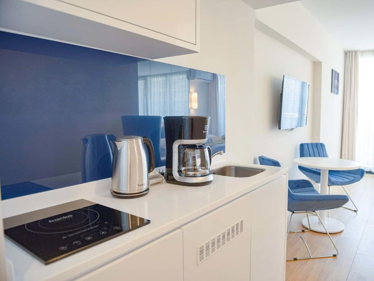 From cooking utensils to modern appliances, you’ll feel right at home preparing meals in this spacious kitchen