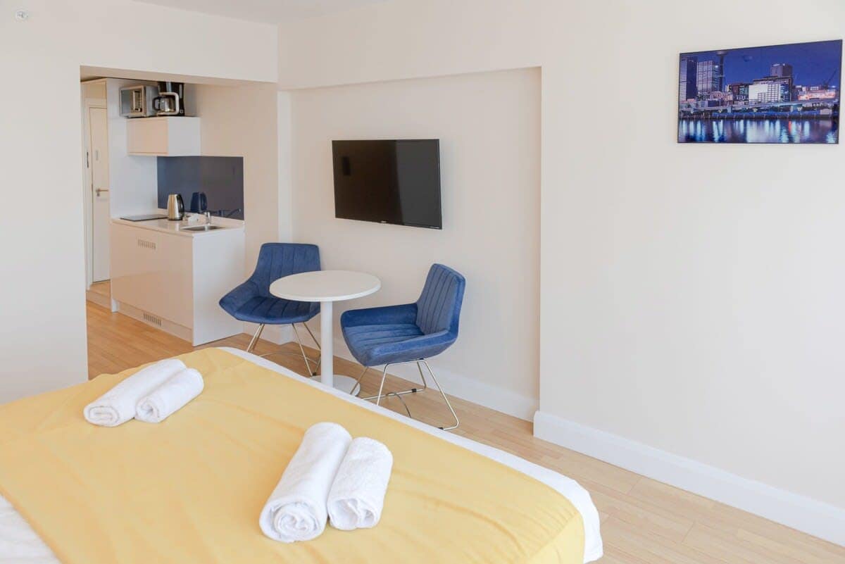 Dining area is thoughtfully arranged, offering a cozy setting for meals or casual conversations