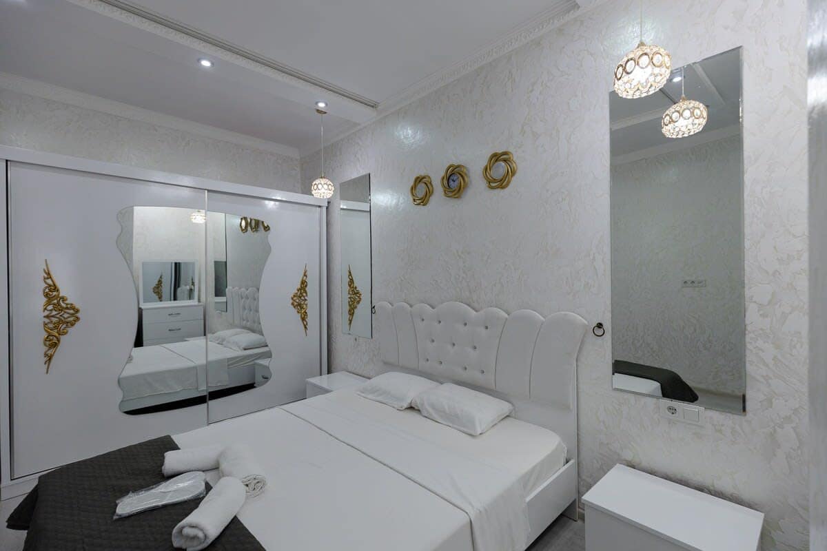 Cozy double bed promises restful nights, offering the perfect balance of comfort and support