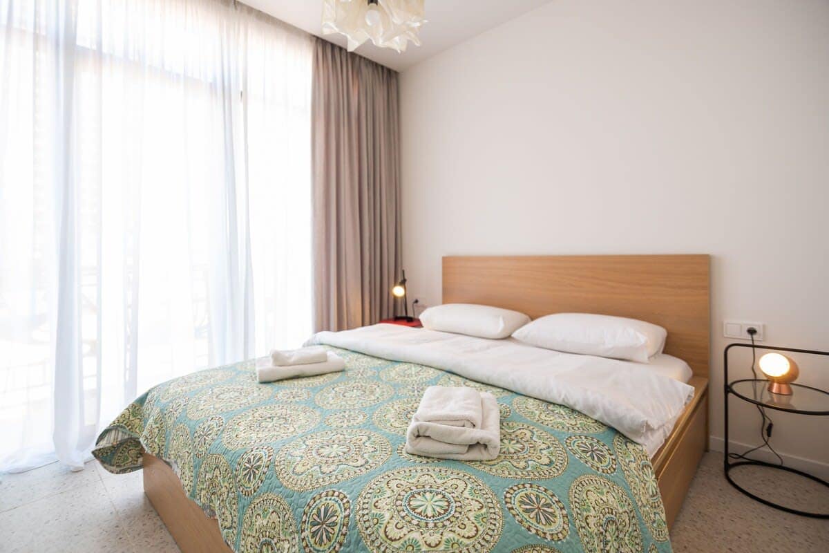 Double bed is dressed in fresh, high-quality linens, guaranteeing a restful sleep