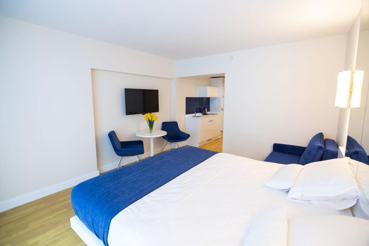 TV is positioned for optimal viewing, allowing you to unwind with your favorite shows or movies in a comfortable setting