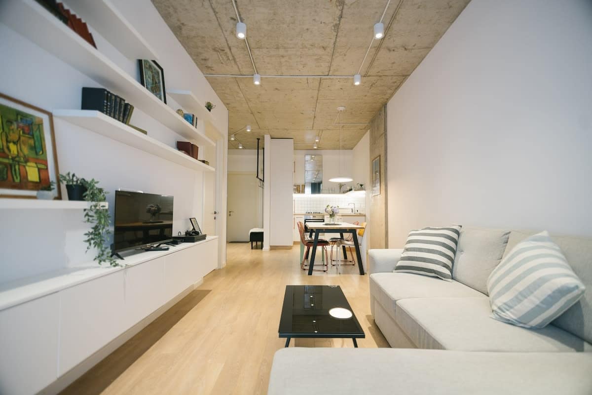 Spacious living room is designed for comfort and relaxation, offering plenty of room to stretch out and unwind