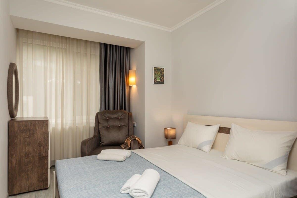 Unwind in this welcoming bedroom, featuring a plush double bed