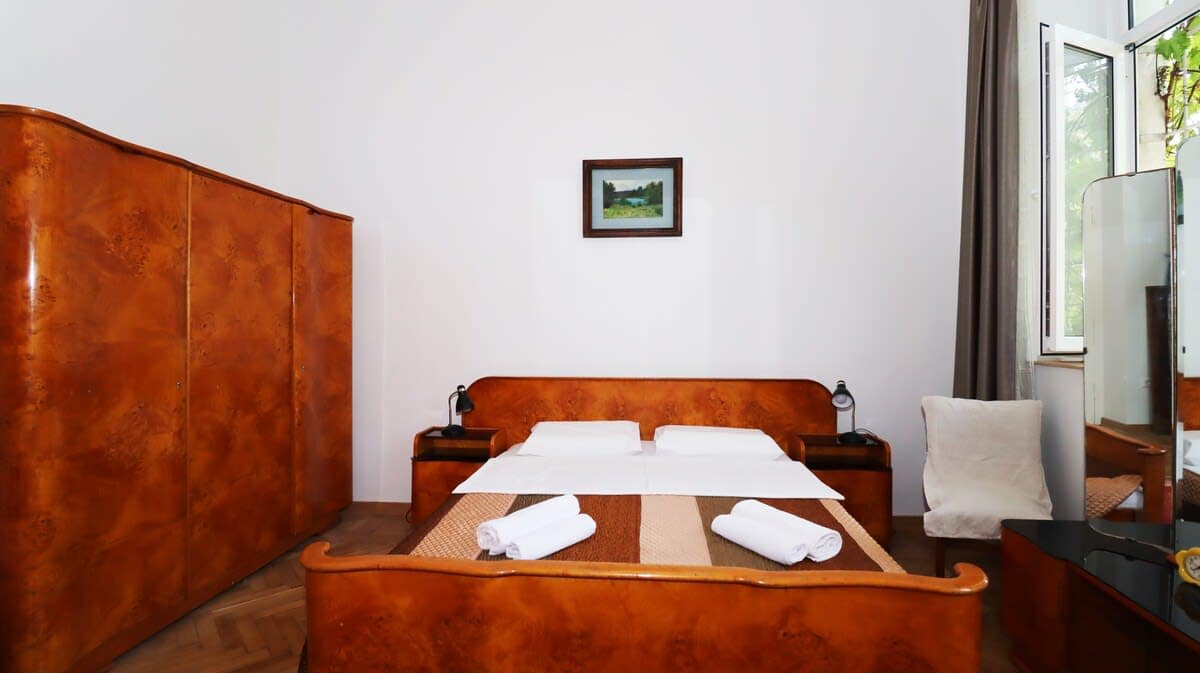 Bright and airy bedroom features comfortable double bed