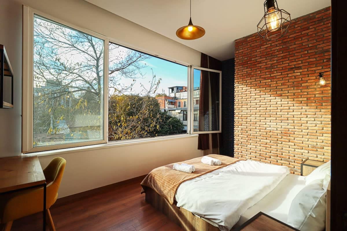 Step into a bright and inviting double bed bedroom, designed for both comfort and style