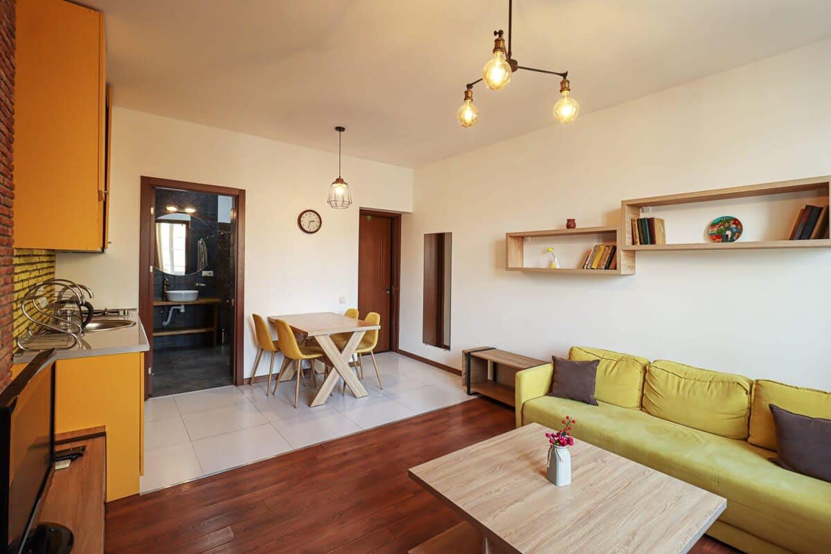 Room exudes a modern yet cozy ambiance, making it the perfect place to relax or entertain guests
