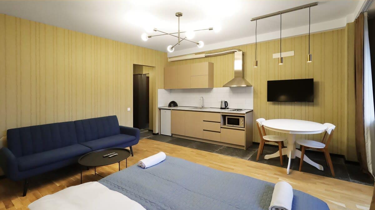 A stylish open-plan layout combines comfort and functionality in one space.