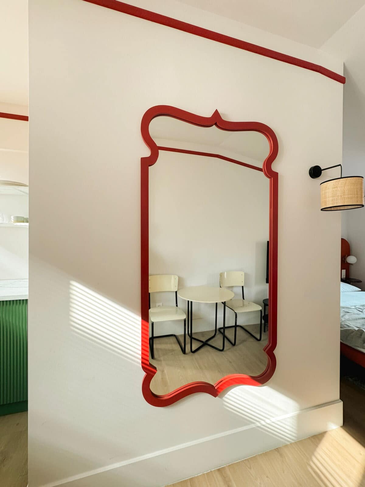 Beautifully placed mirror enhances the room’s brightness