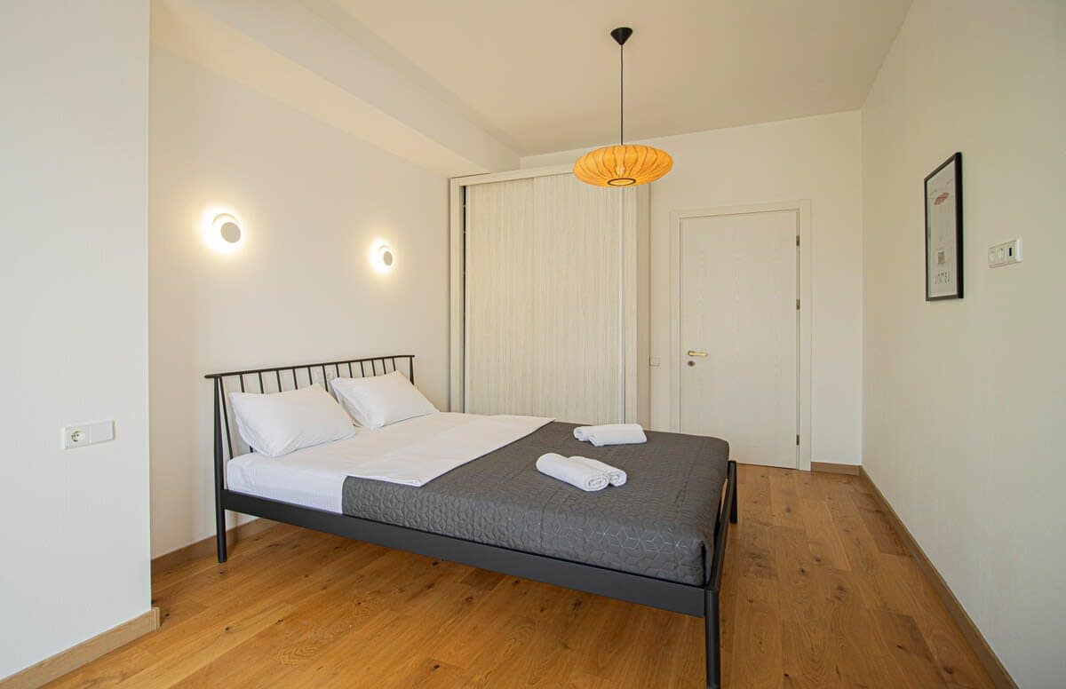 Spacious wardrobe offers ample storage for your clothing and personal belongings